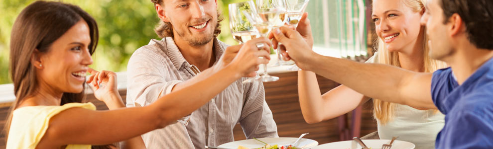 Young diners, toasting a great meal at a restaurant